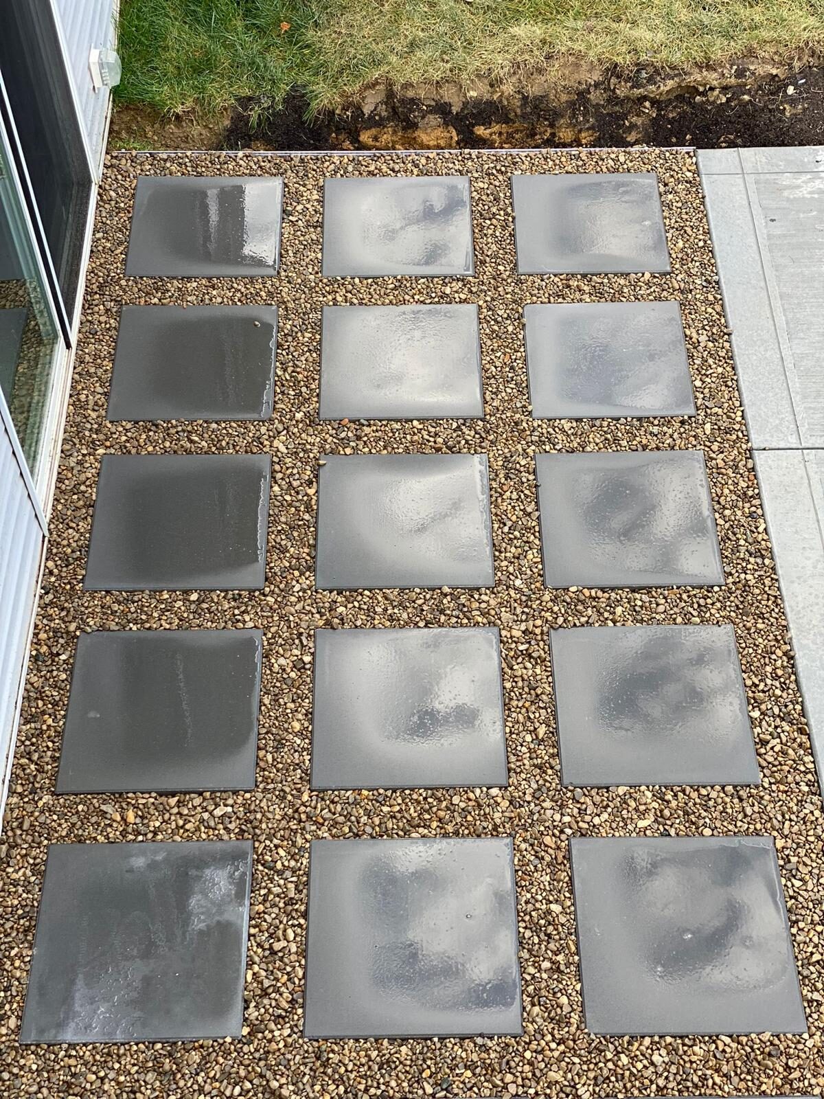 Concrete grid pavers with grass joints